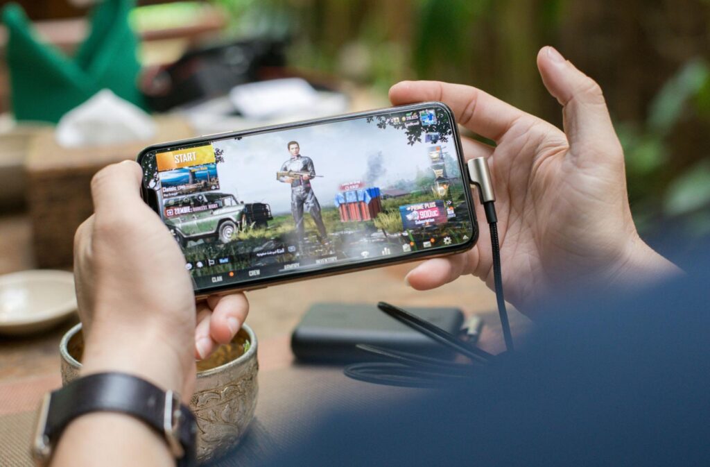A person playing PUBG Mobile on their smartphone